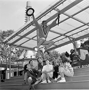 00077 Prints: Sammy Davis Jnr rehearsing with some children at Battersea Festival Gardens for his new