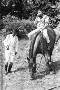00430 Prints: Sammy Davis Junior sulks after his tiff with Director Jerry Lewis on location of