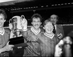 League Cup Prints: Sammy Lee with Alan Kennedy & Phil Neal of Liverpool 1983 with milk cup