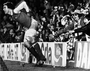 Sammy Nelson of Arsenal wins the approval of the Highbury crowd during a match against