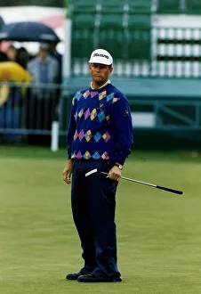 Sandy Lyle Golfer standing on green holding putter club golf