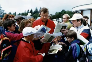 00188 Prints: Sandy Lyle signs autographs for his fans at the British Golf Open