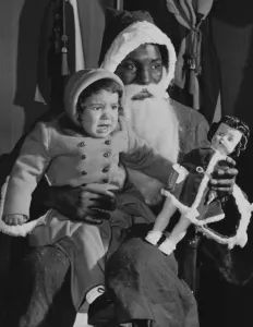 One Girl Only Prints: Sandy Manuel, the Nigerian Boxer acting as Santa Claus at the Commonwealth Exhibition