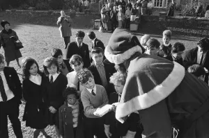 Santa Claus arrives by helicopter at Pestalozzi Village for Children in Sedlescombe