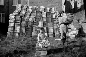 00027 Prints: Santa Claus comes early for 14 month old Patrick Flood, as he plays with the dumped games