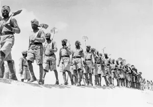 00074 Prints: Sappers and miners of the Indian army marching with their shovels to do a job of digging