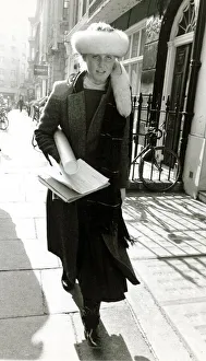 Sarah Ferguson girlfriend of Prince Andrew looking silly Cossack style hat walking