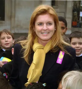 Sarah Ferguson holds Yewande, Andesida November 1999 from St Clement Danes school