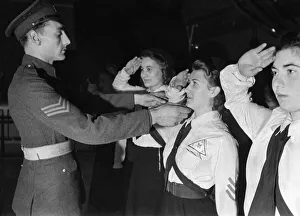 Sargeant Shorter of the Coldstream Guards instructing the new recruits of the girls
