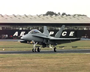 Air Shows Prints: SBAC Farnborough Air Show. An American Navy FA18 Hornet fighter plane at the air