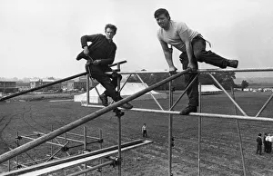 Scaffolding erectors Martin Costello left and Fred Beasley at work on the stage for