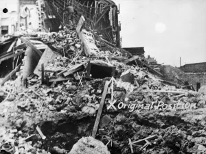 Scene of a bomb strike in which a Morrison shelter was flung 46 feet into a neighbouring