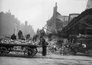 Clearing Prints: Scene of destruction showing damage to housing in Kingston Upon Hull after a bombing