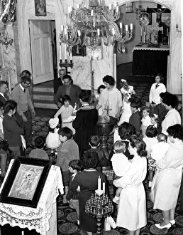 00176 Prints: The scene inside the Greek Orthodox Church furing the ceremony to christen