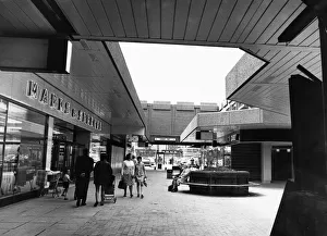 Places Prints: Scenes inside the Salford City Shopping Centre showing customers walking outside Mark