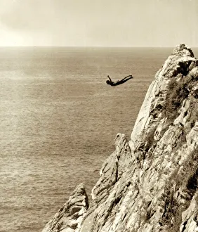 This scenic shot of rocky cliffs and the sea below is the setting for local divers - who