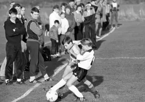 Schoolboys playing football, Nunthorpe and Hemlington battle for possession in the Minor