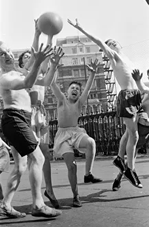 Schoolboys of St martins in the Field take full advantage of the hot weather as they play