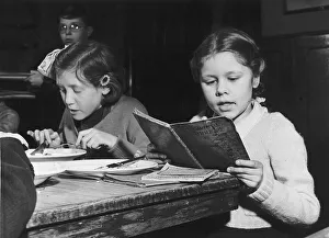 Exam Prints: Schools Jose Wettner a pupil at the John Rennie School London revising for an exam. 1954