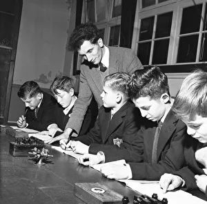 Science master seen here with his students during a revision class prior to sitting their