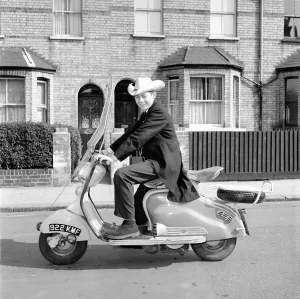 Scooter Prints: Scooter: Martin Coleman seen here riding his Lambretta scooter. March 1958 A663-001