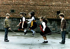 Boys And Girls Prints: Scotland Street School four children playing skipping jumping ropes