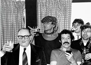 00054 Prints: Scotlands Rock superstar Rod Stewart celebrates with a drink after the England v