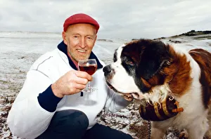 Mountain Prints: Scottish mountaineer Hamish MacInnes with Hamilton the St Bernard dog. Circa 1992