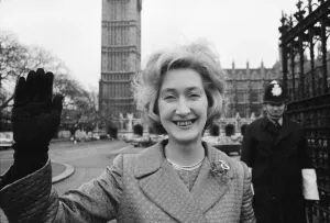 Big Ben Prints: Scottish Nationalist MP Winnie Ewing waves as she stands outside the House of Commons