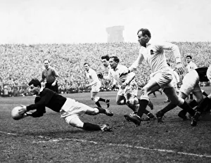 Pass Prints: Scottish scrum half JAT Rodd passes the ball out from a scrum during the Five Nations