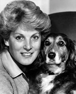 Images Dated 14th June 1981: Scottish singer Moira Anderson with her dog Jimmy, who she found 3 years ago lying