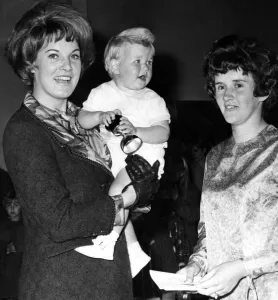 Scottish singer Moira Anderson holding 14 month old Ian Graham