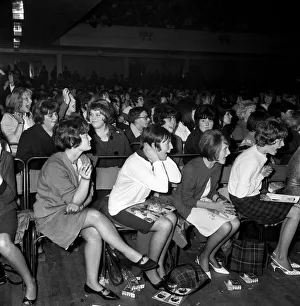 Beatlemania Prints: Screaming girl fans greet the Beatles last night on their appearance in Leicester