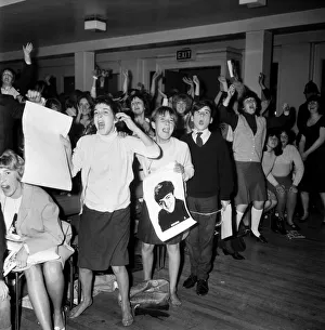 Beatlemania Prints: Screaming girl fans greet the Beatles last night on their appearance in Leicester