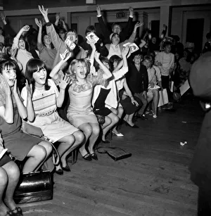 Screaming girl fans greet the Beatles last night on their appearance in Leicester