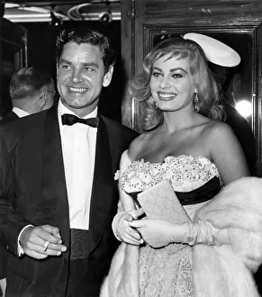 Screaming teen-agers mobbed Anita Ekberg and Anthony Steele when they went to the Empire