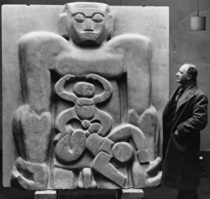 Sculpture Prints: Sculptor Jacob Epstein seen here at the Leicester Square Gallery with his piece Primeval