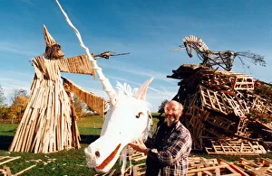 Artist Prints: Sculptor, Phil Bews with his bonfire sculptures of a wizard and a unicorn