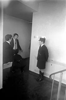 Civil War Prints: SDLP politician John Hume MP, being searched inside the county hall by police