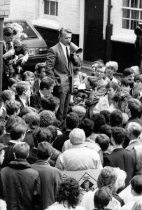 SDP politician David Owen speaking to crowds through a megaphone on the election trail