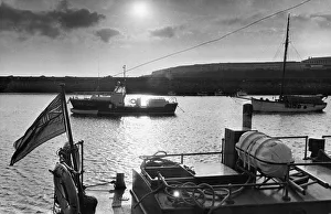 Tranquil Prints: The sea is pool-placid as the sun goes down and the Barry lifeboat stands at her harbour