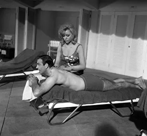 Sean Connery on the set of the James Bond movie Goldfinger being shot at Pinewood studios