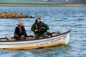 Sean Wilson Actor October 98 Coronation Street actor on small fishing boat on lake