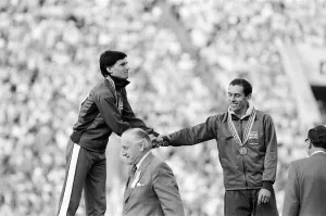 00114 Prints: Sebastian Coe stands on podium during medal ceremony after Mens 1500 metres final