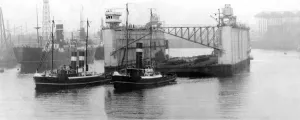 Tugs Prints: The second section of the huge Singapore dock leaving Wallsend Slipway in 1928