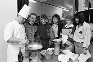 Chef Prints: Second year student Simon Taylor makes flamb? pancakes in brandy for school pupils