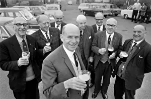 Secretary of the Bald Head d Mens Club Vic Hinds with some of his members outside