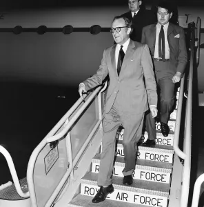 Government Prints: Secretary of State for Defence Lord Carrington arrives at Heathrow Airport from Rome