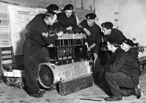 Instruction Prints: A sectionised old bus engine is used to teach these members of a West Country Tank Corps