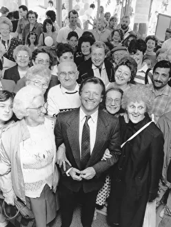 00324 Prints: A seething mass of fans greeted Coronation Street star Johnny Briggs when he opened a new